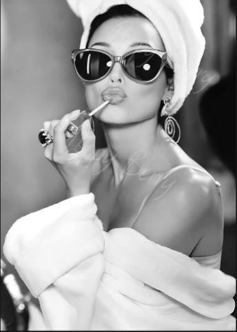Black and white fashion portrait with sunglasses and a towel wrap